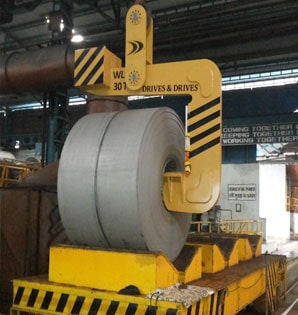 loading steel coils to V saddle of coil transverser and coil upenders by C hook-min